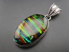 GJ69 AMMOLITH OPAL (LAB) OVAL