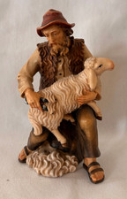 Schafscherer mit Schaf