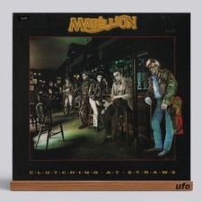 Marillion - Clutching At