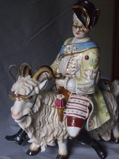 Schneider auf dem Ziegenbock -