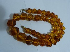 Bernsteincollier, Cognac, geschliffen, 44,66 gr.,ca. 49,5 cm, Oese 333 Gold,