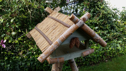 Massives vogelhaus - massives,