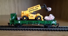 Niederbordwagen m. Teleskoplader  "NEW HOLLAND"  u.  Rohren , Unikat  TT