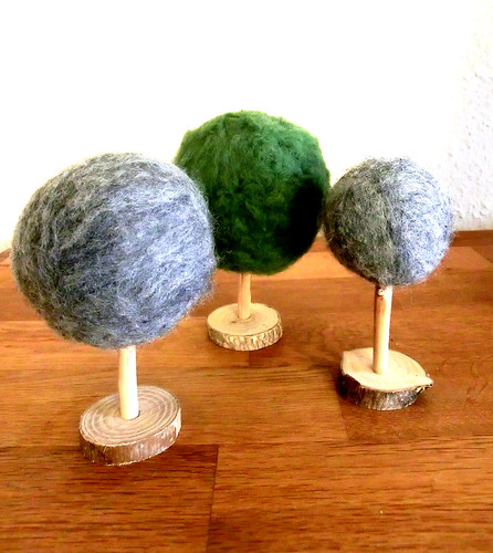 Filz baume mit holz - baume,