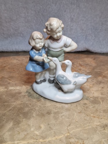 Alte kleine porzellanfigur mir - kleine,