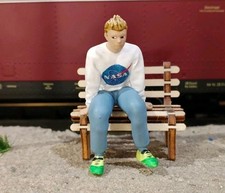 Spur figur sitzender - g,