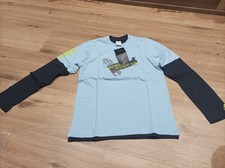 Adidas Just Sports T-Shirt –