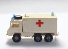 BB298, Alter Roco Steyr-Puch Pinzgauer Koffer Krankenwagen Rotes Kreuz beige TOP