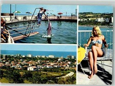 38134844 - Riccione Aquarium der Delfine Panorama des Ortes Frau in Bikini