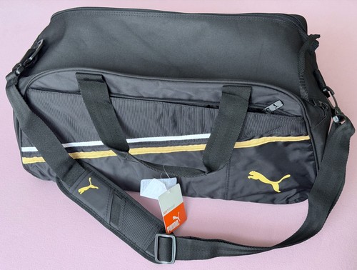 Puma black team gold white - black,