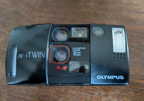 Olympus twin 70mm - af-1, f
