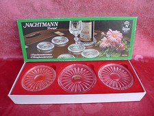 7 schöne Untersetzer (6 Glasunt. ,1 Flaschenunt.) Bleikristall  Nachtmann Europa