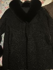 Used astrakhan and - , fur