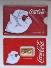5g Goldbarren PAMP im roten Blister mit Motiv Coca Cola Eisbären inkl. Hülle