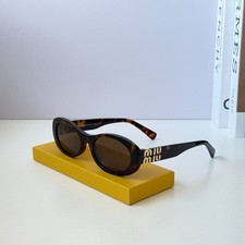 Miu Miu SMU06Z Oval Sunglasses