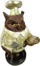 Koch Eule mit Fisch auf dem