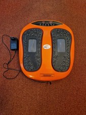 Massagegerät für Entspannte Beine, mit Fernbedienung und Bedienungsanleitung.