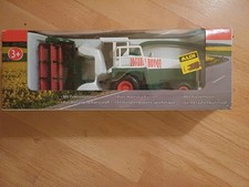 Welly Traktor mit Mähdrescher  Neuwertig 1:32