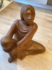 Der singende Mann, Holzfigur