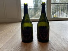 2x leere Dom perignon Flasche Rosé leuchtend