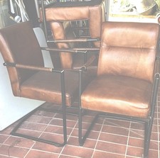 Mid Century Style Lederstühle 