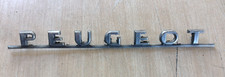 Emblem "Peugeot" in chrom