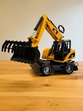 Bruder Bagger CAT Adapter