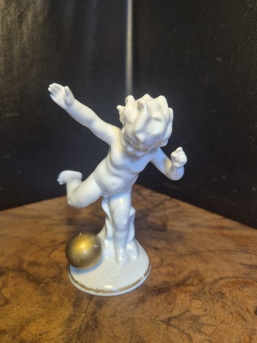 Kleine porzellanfigur putto - kleine,