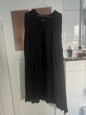 Bluse Nü Danmark, außergewöhnlich da vorne taillenkurz und hinten lang