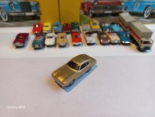 0201 Faller AMS Ford Capri Typ 1 in Gold-Metallic lackiert.