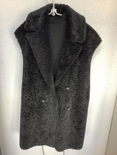 Fellimitat Wende Weste In Schwarz, mit Seitlichen Taschen 