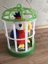 Sprechender Papagei mit Käfig 