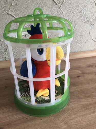 Sprechender papagei mit käfig - sprechender,