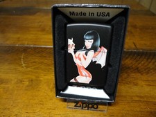 DEVIL WOMAN HOLDING SKULL