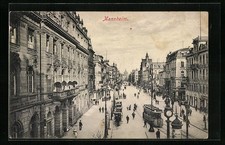 Mannheim, Straßenpartie mit Geschäften und Strassenbahn, Ansichtskarte 1909 