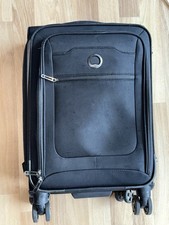 Delsey Paris Handgepäck-Koffer (schwarz) mit 4 drehbarenRollen und Teleskopgriff