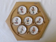 M. J. Hummel 7 Tellerchen Goebel + Wandholzregal-achteckig, gut erhalten