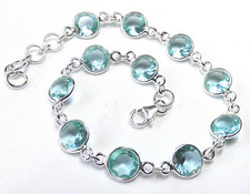 ?Armband 925 Silber mit rundem, facettiertem Blautopas ? helles Aqua Blau ?