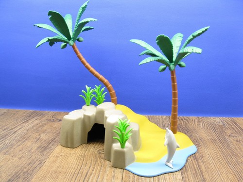 Palmeninsel mit baby delfin - palmeninsel,