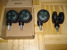 4 x Kofferrollen aus Hartplastik, schwarz/grün, Ø 55 mm, Spurbreite 42 mm