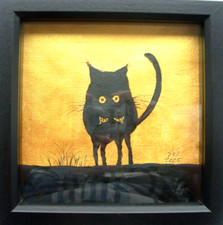 Schwarze Katze gerahmt