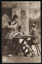 Ansichtskarte Familie bei einem Tisch, Mann spielt Zither 