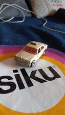 siku 1042 Mercedes 500SE Umbau Taxi Elfenbein 