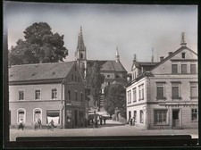 Ansicht Schirgiswalde, Geschäft Jos. Lödmann Sen. Nachf. und Blick zur Kirche 