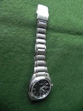 CITIZEN ECO-DRIVE WR 100 Titanium.  Durchmesser ca. 35 mm, Datum bei 9 Uhr