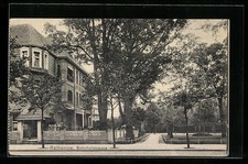 Ansichtskarte Rathenow, Bahnhofstrasse mit Bäumen 