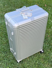 Travelite Next Trolley L 4-Rollen Aluminium silber  77x52x29 Hartschalenkoffer