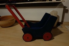Kinderpuppenwagen Massivholz Marke Haba bunt (blau&rot)