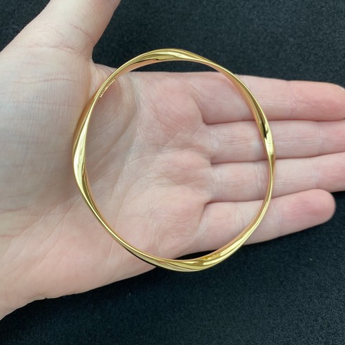Dreharmreif gelbgold - 18,