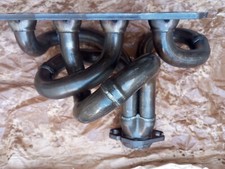 KRÜMMER AUSPUFF EDELSTAHL